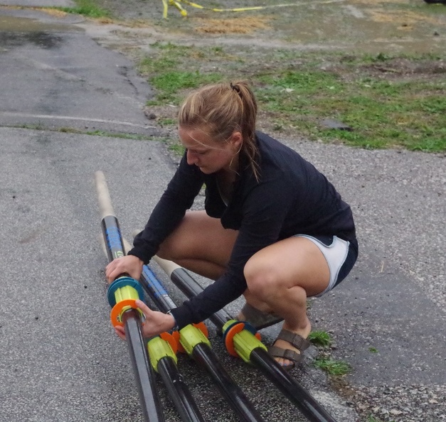 Caitlin helping with oars.JPG